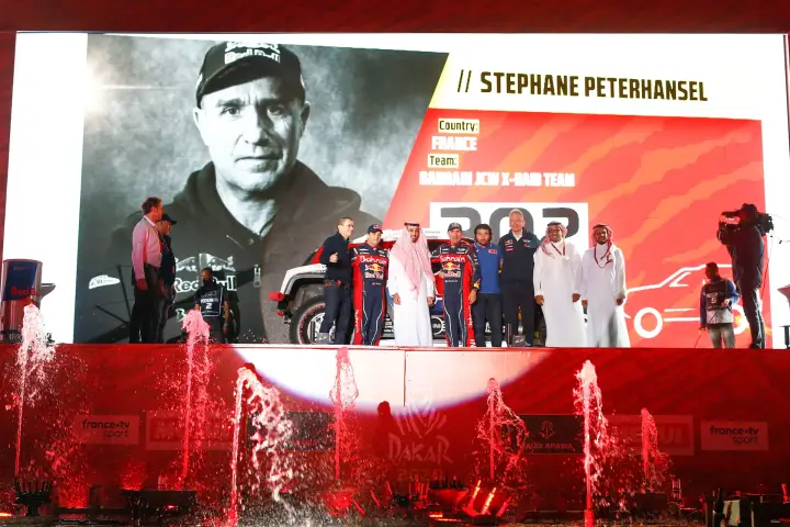 Dakar Rally 2020: Peterhansel team on stage with large screen portrait